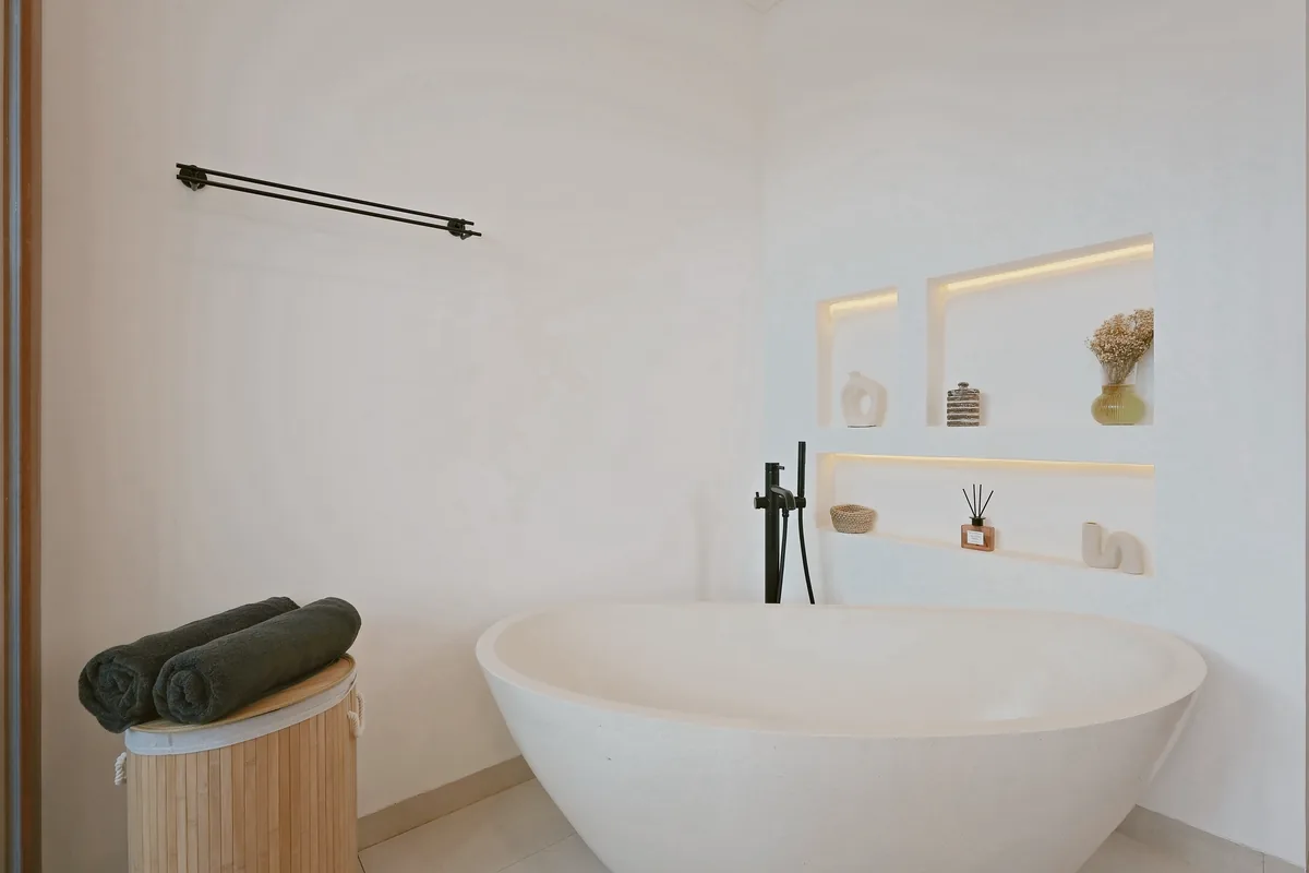 Bathrooms · Freestanding stone bathtub