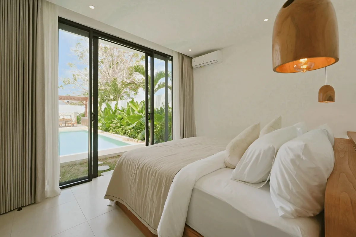 Three bedrooms · Garden bedroom, pool access