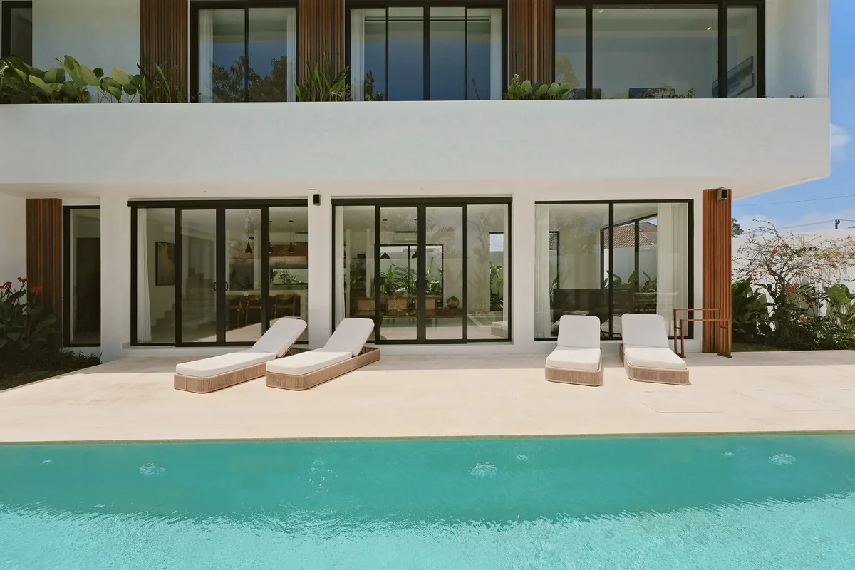 Pool & garden · Loungers by the water